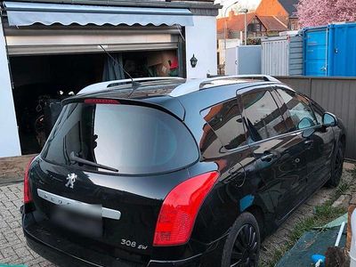 Gebraucht Peugeot 308 SW 109 PS (80 kW) 2010 Schwarz Kombi