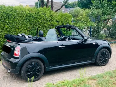 Gebraucht Mini Cooper Cabriolet 122 PS (89 kW) 2011 Schwarz Cabrio