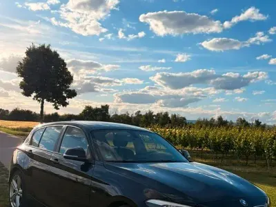 Gebraucht BMW 118 Sport Line 170 PS (125 kW) 2011 Schwarz Kleinwagen