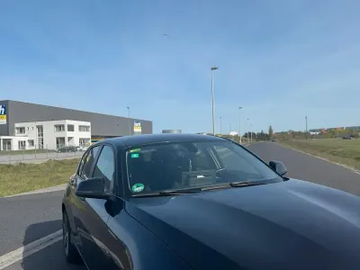 Gebraucht BMW 116 Sport Line 170 PS (125 kW) 2011 Schwarz Kleinwagen
