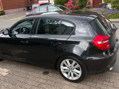 Gebraucht BMW 116 115 PS (84 kW) 2010 Schwarz Kleinwagen