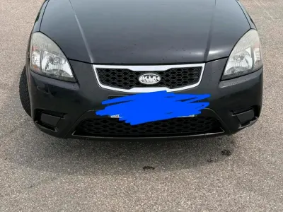 Gebraucht Kia Rio 2010 Schwarz Kleinwagen