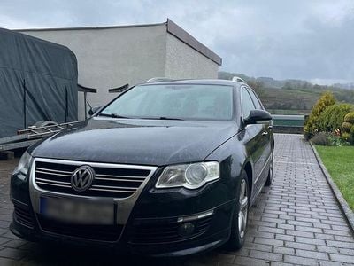 Second-hand VW Passat R-line 170 CP (125 kW) 2010 Negru Break