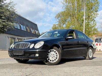 Second-hand Mercedes E200 Elegance 163 CP (119 kW) 2006 Negru Berlinǎ