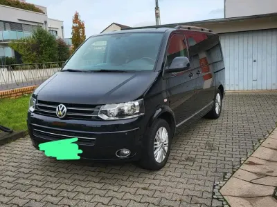 Używany VW Multivan 180 KM (132 kW) 2014 Czarny Minivan