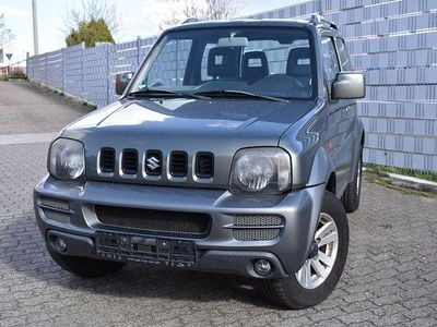 Usado Suzuki Jimny Club 86 HP (63 kW) 2009 Cinzento SUV