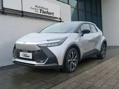 Gebraucht Toyota C-HR Team 140 PS (102 kW) 2023 Shimmering silver metallic / dach schwarz SUV