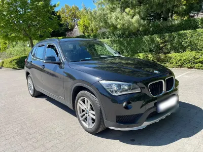 Second-hand BMW X1 143 CP (105 kW) 2014 Negru SUV