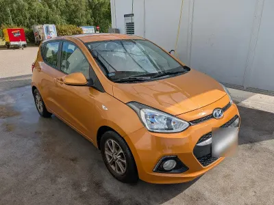 Gebraucht Hyundai i10 67 PS (49 kW) 2015 Orange Kleinwagen