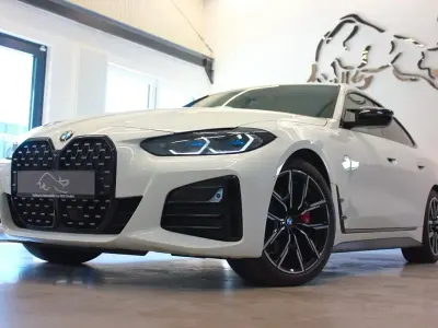 Gebraucht BMW M440 Performance 374 PS (275 kW) 2023 Alpinweiss uni Limousine