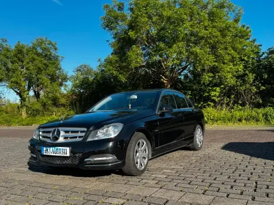 Używany Mercedes C250 204 KM (150 kW) 2012 Czarny Sedan/Limuzyna