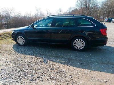 Second-hand Skoda Superb 140 CP (102 kW) 2013 Negru Break