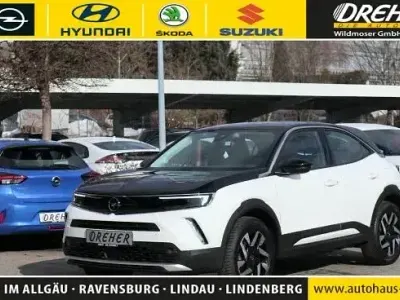 Gebraucht Opel Mokka-e Elegance 100 kW (136 PS) 2023 Arktis weiß SUV