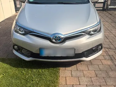 Gebraucht Toyota Auris Hybrid 99 PS (72 kW) 2016 Grau Kleinwagen