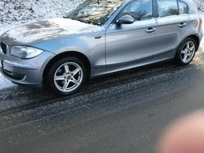 Gebraucht BMW 116 122 PS (89 kW) 2009 Grau Kleinwagen
