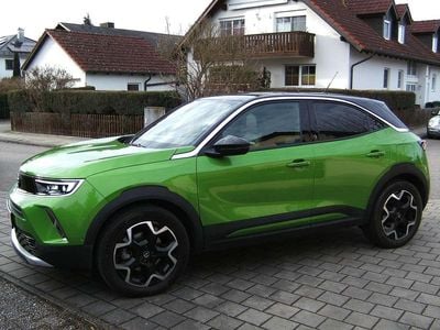 Gebraucht Opel Mokka-e Elegance 100 kW (136 PS) 2021 Matcha green/ikone gruen SUV