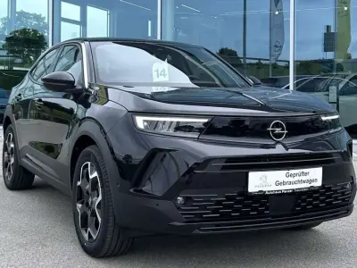 Gebraucht Opel Mokka-e Ultimate 100 kW (136 PS) 2024 Karbon schwarz metallic SUV