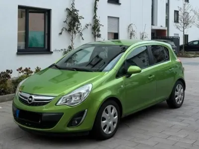 Gebraucht Opel Corsa 95 PS (69 kW) 2012 Grün Kleinwagen