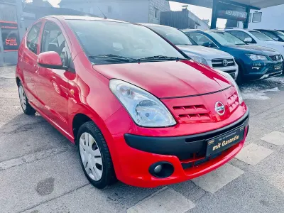 Gebraucht Nissan Pixo Acenta 68 PS (50 kW) 2010 Rot Kleinwagen