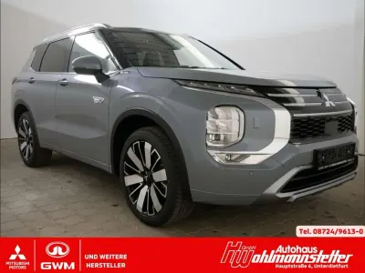Gebraucht Mitsubishi Outlander P-HEV Top 306 PS (225 kW) 2025 Mondsteingrau SUV