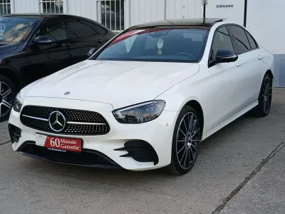 Gebraucht Mercedes E400 AMG 330 PS (242 kW) 2022 Diamamtweiss designo metallic Limousine