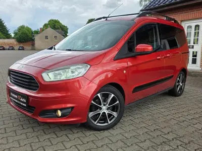 Gebraucht Ford Tourneo Courier Trend 95 PS (69 kW) 2015 Rot Van / Kleinbus