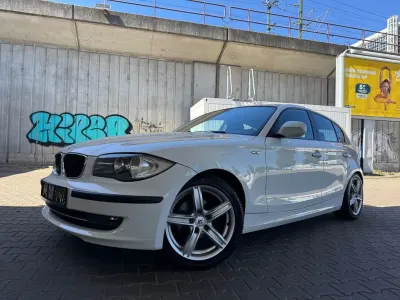 Używany BMW 116 Lifestyle 122 KM (89 kW) 2010 Biały Hatchback