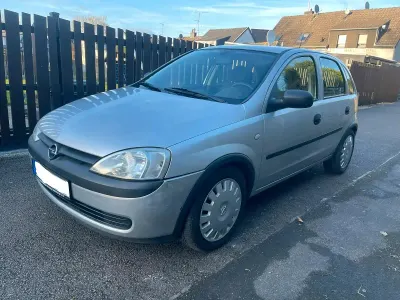 Używany Opel Corsa 75 KM (55 kW) 2002 Srebrny Hatchback