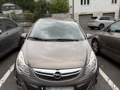Gebraucht Opel Corsa Edition 87 PS (63 kW) 2012 Braun Kleinwagen