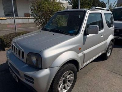Second-hand Suzuki Jimny Style 86 CP (63 kW) 2012 Argintiu SUV