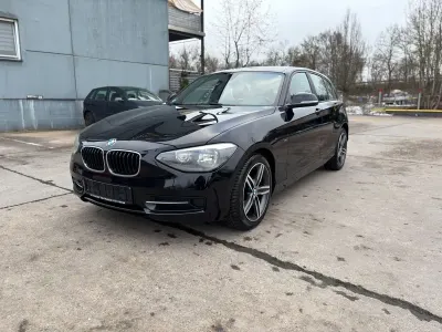 Używany BMW 116 Advantage 136 KM (100 kW) 2012 Czarny Hatchback