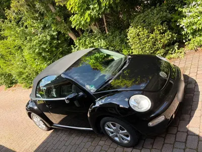 Gebraucht VW New Beetle Highline 101 PS (74 kW) 2004 Schwarz Kleinwagen
