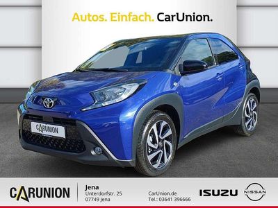 Gebraucht Toyota Aygo X 72 PS (52 kW) 2025 Juniper blue (8y8)/ black mica (209) SUV