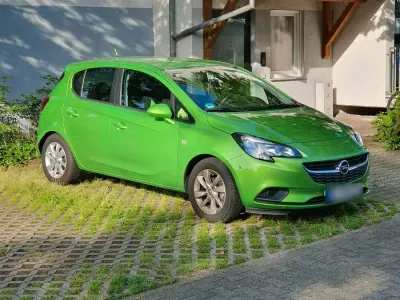 Gebraucht Opel Corsa drive 73 PS (53 kW) 2016 Grün Kleinwagen