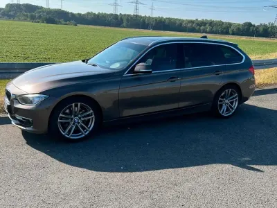Gebraucht BMW 330 258 PS (189 kW) 2012 Braun Kombi
