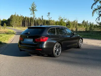 Gebraucht BMW 320 Sport Line 184 PS (135 kW) 2013 Schwarz Kombi