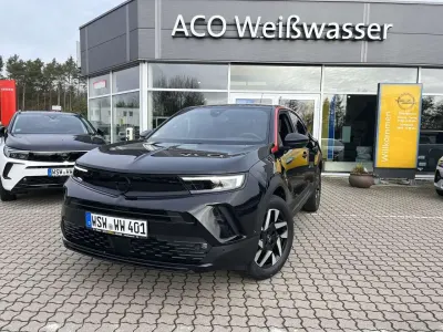 Gebraucht Opel Mokka 136 PS (100 kW) 2024 Karbon schwarz metallic SUV