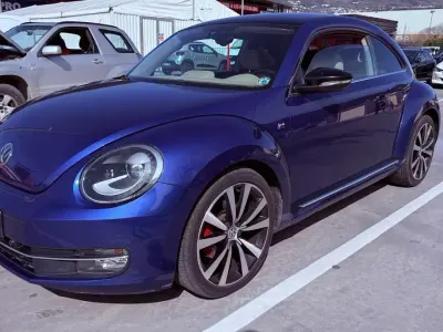 Używany VW Beetle Exclusive 211 KM (155 kW) 2014 Niebieski Hatchback