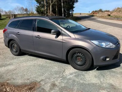 Gebraucht Ford Focus 125 PS (91 kW) 2014 Braun Kombi