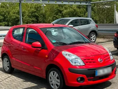 Gebraucht Nissan Pixo 68 PS (50 kW) 2009 Rot Kleinwagen