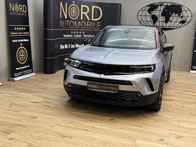 Gebraucht Opel Mokka-e GS Line 100 kW (136 PS) 2022 Quarz silber (metallic) SUV