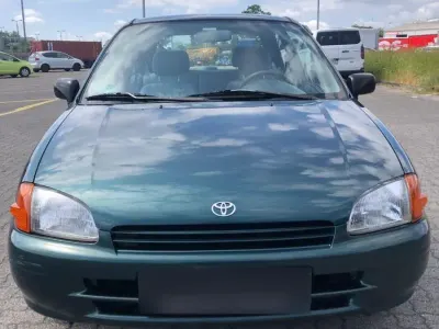 Gebraucht Toyota Starlet 75 PS (55 kW) 1997 Grün Kleinwagen