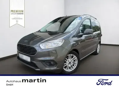 Gebraucht Ford Tourneo Courier Titanium 101 PS (74 kW) 2019 Magnetic grau Van / Kleinbus