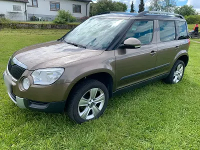 Gebraucht Skoda Yeti Ambition 105 PS (77 kW) 2012 Braun SUV