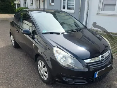Używany Opel Corsa Edition 87 KM (63 kW) 2010 Czarny Hatchback