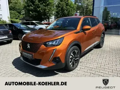 Gebraucht Peugeot e-2008 Allure 100 kW (136 PS) 2021 Lackierung orange fusion/typ a SUV