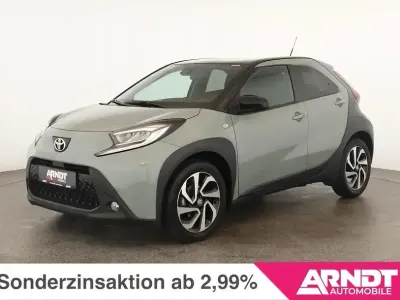 Gebraucht Toyota Aygo X Team 72 PS (52 kW) 2024 Urban khaki/ night sky black SUV