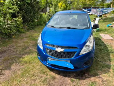 Używany Chevrolet Spark 65 KM (47 kW) 2011 Niebieski Hatchback