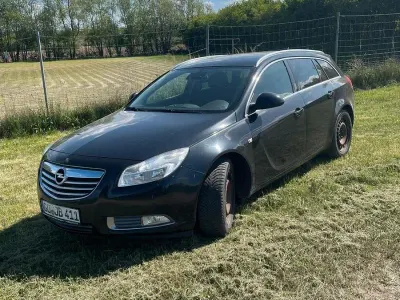 Używany Opel Insignia Innovation 131 KM (96 kW) 2011 Czarny Kombi
