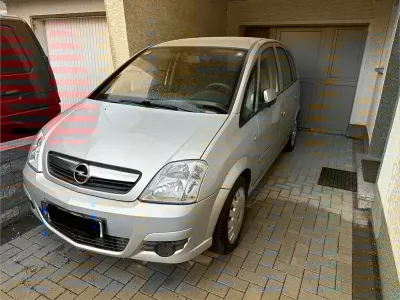Używany Opel Meriva Edition 105 KM (77 kW) 2009 Srebrny Minivan